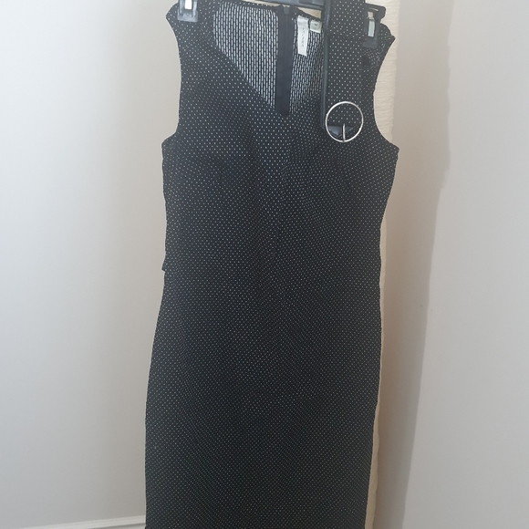 A short black TACERA medium size gown ..approximately 40inches long - Picture 1 of 3